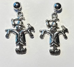 Ornate silver cross skull earrings