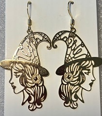 Ornate brass face profile earrings